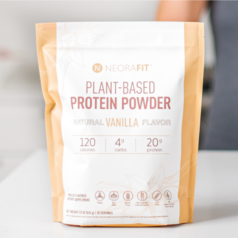 Lifestyle shot of the NeoraFit Plant-Based Protein Powder sitting on a white counter.